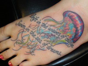 Jellyfish tattoo with quote