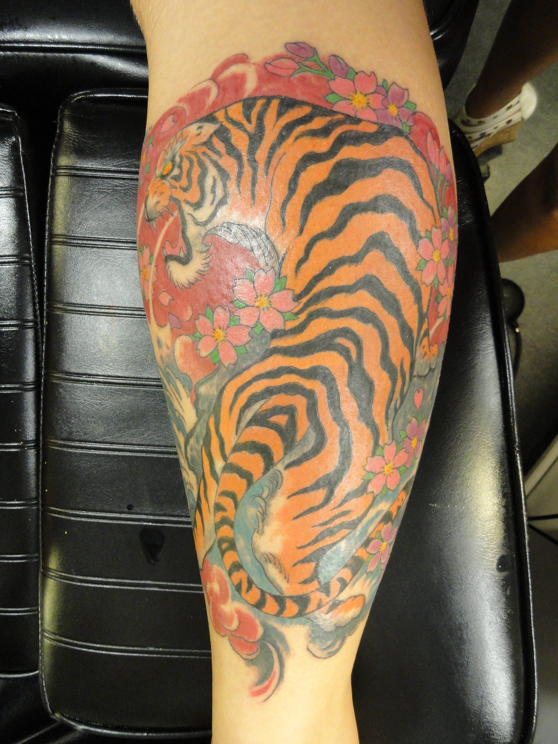 oriental tiger on calf muscle